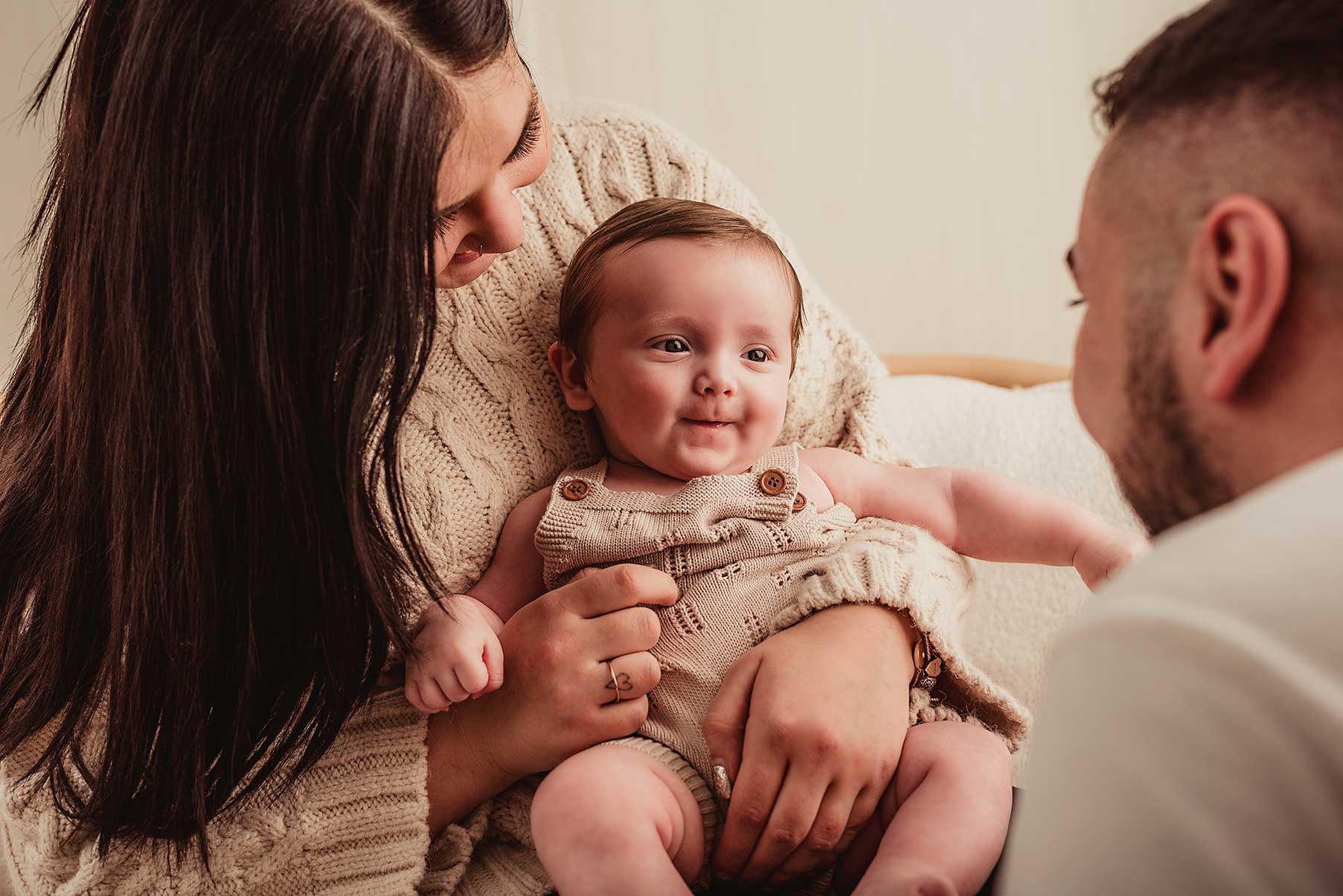 Family photoshoot with a newborn baby boy